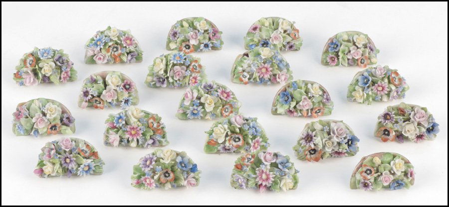 SET OF TWENTY CAPODIMONTE FLORAL PORCELAIN PLA: SET OF TWENTY CAPODIMONTE FLORAL PORCELAIN PLACE CARD HOLDERS. 1.5" x 2.5"