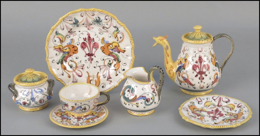 ITALIAN FAIENCE TEA SERVICE.: ITALIAN FAIENCE TEA SERVICE. Comprised of a teapot, creamer, sugar bowl, six plates, seven teacups, and six saucers