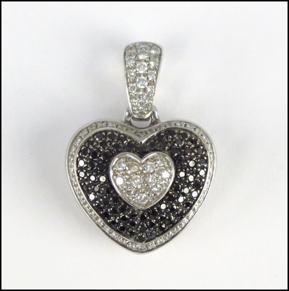 LEO PIZZO 18 KARAT WHITE GOLD, BLACK AND WHITE: LEO PIZZO 18 KARAT WHITE GOLD, BLACK AND WHITE DIAMOND HEART PENDANT/ENHANCER.