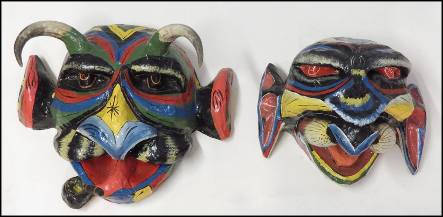 TWO HAITIAN PAPER MACHE CARNIVAL MASKS.: TWO HAITIAN PAPER MACHE CARNIVAL MASKS. Largest 19" x 22"