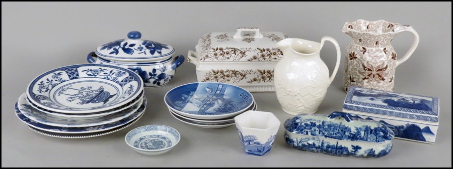 COLLECTION OF BLUE AND WHITE PORCELAIN TABLE I: COLLECTION OF BLUE AND WHITE PORCELAIN TABLE ITEMS. Comprised of three covered boxes, two dishes, and eight plates. Together with a Mason Patent Ironstone 'Bour Bells' pattern pitcher, a Wedgwood pitc