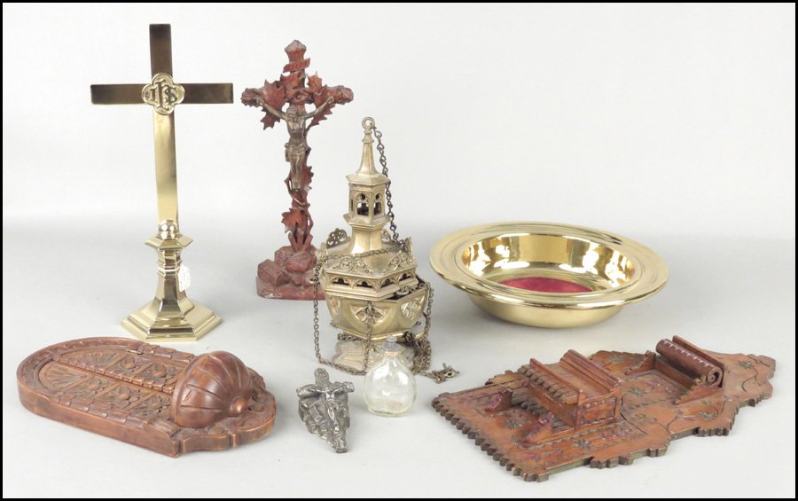 A VARIETY OF RELIGIOUS ACCESSORIES.: A VARIETY OF RELIGIOUS ACCESSORIES. Comprised of a table stand Crucifix, a brass collection tray, a brass table stand cross, two wood wall plaques, and a patinated metal incense burner. a glass holy w