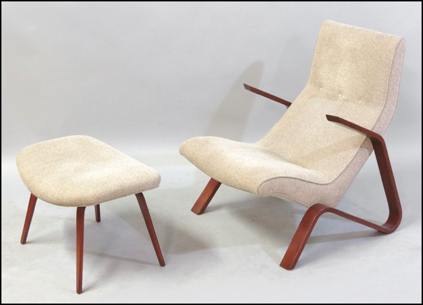 UPHOLSTERED ARMCHAIR.: UPHOLSTERED ARMCHAIR. Together with matching upholstered footstool (H: 15.5" W: 24" D: 18.5") H: 34" W: 28" D: 30"