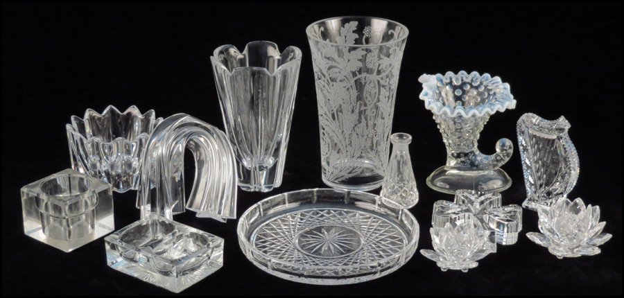 COLLECTION OF CRYSTAL TABLE ARTICLES.: COLLECTION OF CRYSTAL TABLE ARTICLES. Comprised of a Waterford shamrock paperweight, a Waterford plate, a Waterford harp, a Waterford bud vase, an Orrefors bowl, a Steuben 'star stream', an Orrefors v