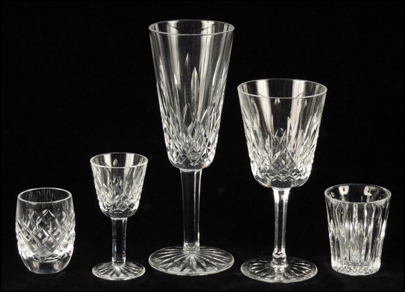 WATERFORD CRYSTAL STEMWARE IN THE LISMORE PATT: WATERFORD CRYSTAL STEMWARE IN THE LISMORE PATTERN. Comprising four wine goblets, four cordials, and three champagne flutes. Together with a set of four Waterdord crystal shot glasses, and one Waterfor