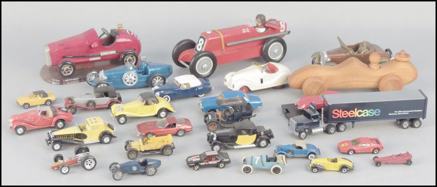 COLLECTION OF MODEL TOY CARS.: COLLECTION OF MODEL TOY CARS. Comprised of wood, aluminum, and plastic cars. Includes Lesney cars, a matchbox Ferrari, Auburn, 1928 Bugatti, and No 6 Mercedes, a Rio Lincoln Continental, a Solido Ferr