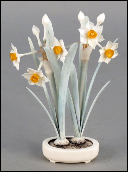 CARVED AND PAINTED IVORY FLORAL COMPOSITION.: CARVED AND PAINTED IVORY FLORAL COMPOSITION. Underside bears a two character mark Height: 5"