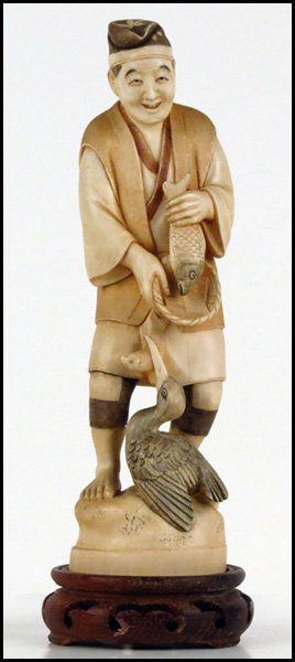 JAPANESE CARVED IVORY FIGURE OF A FISHERMAN.: JAPANESE CARVED IVORY FIGURE OF A FISHERMAN. Provenance: The Collection of G. Jules Marder, past president of the Oriental Art Club of Chicago H:9"