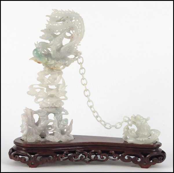 CHINESE CARVED JADE GROUP DEPICTING DRAGONS AN: CHINESE CARVED JADE GROUP DEPICTING DRAGONS AND BIRDS. H:9"