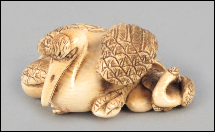 JAPANESE CARVED IVORY NETSUKE DEPICTING CRANES: JAPANESE CARVED IVORY NETSUKE DEPICTING CRANES. Signed H: 1" W: 2" D: 1.5"