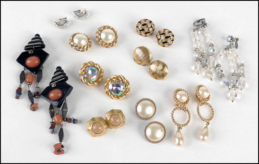 GROUP OF SIGNED EARCLIPS.: GROUP OF SIGNED EARCLIPS. Swarovski, Christian Dior, Sorrelli, Monet, Carolee, Vendome, and others