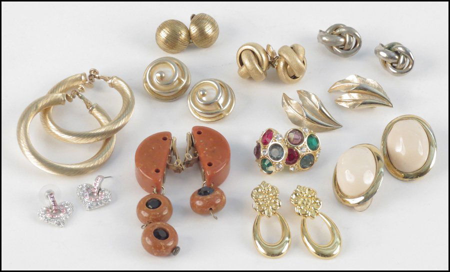 GROUP OF SIGNED EARCLIPS.: GROUP OF SIGNED EARCLIPS. Including Givenchy post earrings, Erwin Pearl, Swarovski, Les Bernard, Sorrelli, Monet, Trifari, Napier, Coro, Marino, and others