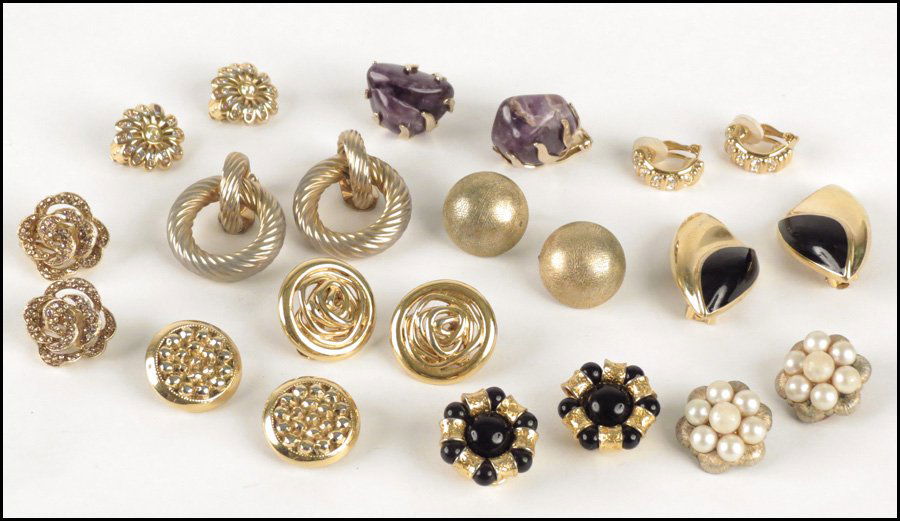 GROUP OF SIGNED EARCLIPS.: GROUP OF SIGNED EARCLIPS. Including Bergere, Marino, Christian Dior, Swarovski, St. John, Monet, Graziano, Trifari, and Kramer