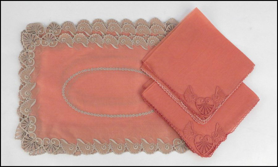 SIX MARGHAB PLACEMATS AND SIX MARGHAB NAPKINS.: SIX MARGHAB PLACEMATS AND SIX MARGHAB NAPKINS. Shell pattern embroidery in watermelon and taupe, watermelon margandie