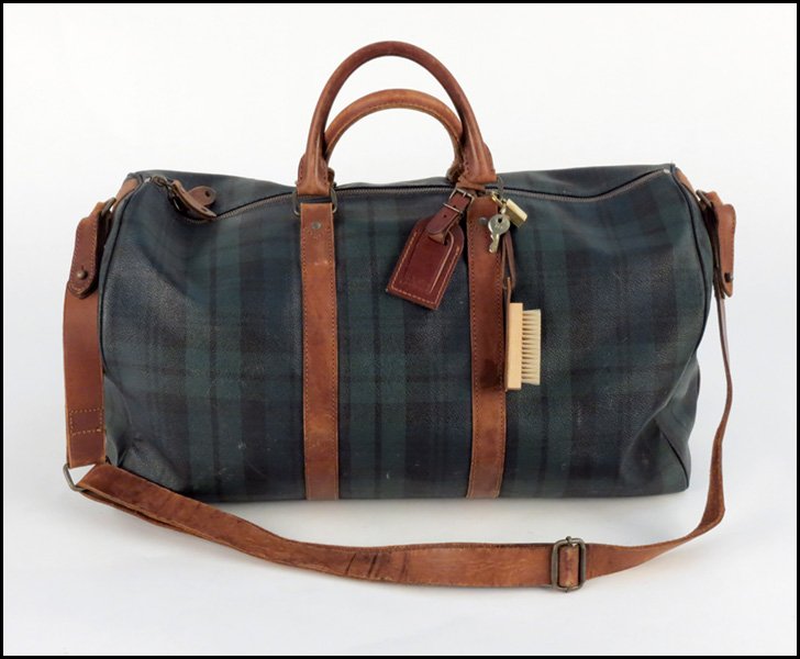 RALPH LAUREN BLACKWATCH CANVAS AND LEATHER DUFF: RALPH LAUREN BLACKWATCH CANVAS AND LEATHER DUFFLE. With a detachable strag, luggage tag, wax brush, padlock, and two keys H: 10" W: 19" D: 9"