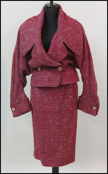 KARL LAGERFELD MAROON WOOL ENSEMBLE.: KARL LAGERFELD MAROON WOOL ENSEMBLE. Comprising a jacket with wide lapels and collar, and a skirt. Both pieces lined
