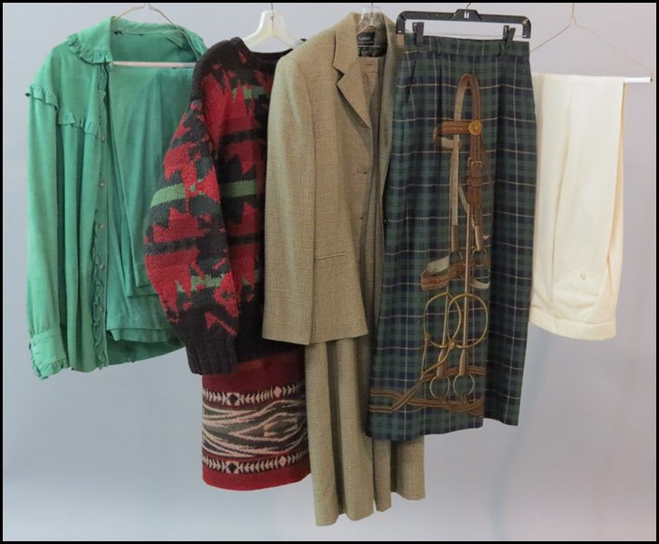 GROUP OF RALPH LAUREN.: GROUP OF RALPH LAUREN. Comprised of a houndstooth wool pant suit, a Navajo style wool wrap skirt, a wool sweater, a green ultra suede ensemble, a pair of white pants, and a green wool equestrian motif