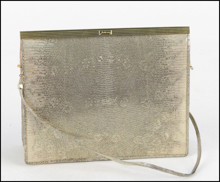 JUDITH LEIBER GOLD LEATHER HANDBAG.: JUDITH LEIBER GOLD LEATHER HANDBAG. With removeable shoulder strap, interior mirror, and change purse H: 7" W: 9" D: 2.5"