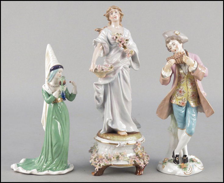 ENGLISH CHELSEA DERBY STYLE PAINTED AND GILT P: ENGLISH CHELSEA DERBY STYLE PAINTED AND GILT PORCELAIN FIGURE PLAYING THE FLUTE. Bearing a gilt anchor marking on the reverse. Together with a Schierholz porcelain figure of a maiden with flowers, and