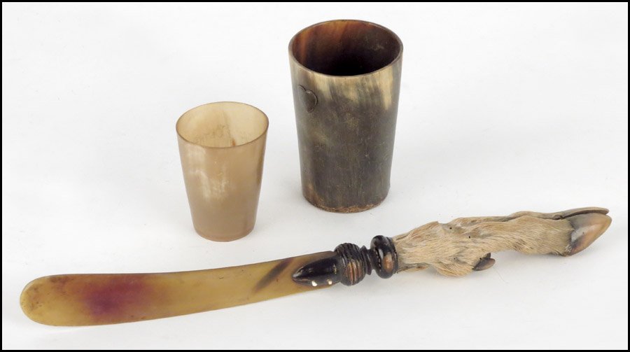 TWO VICTORIAN HORN CUPS.: TWO VICTORIAN HORN CUPS. One bearing an engraved silver heart along the outside, and a glass bottom. The smaller cup bears an inscription reading "Bethel ME". Together with a taxidermy hoof letter ope