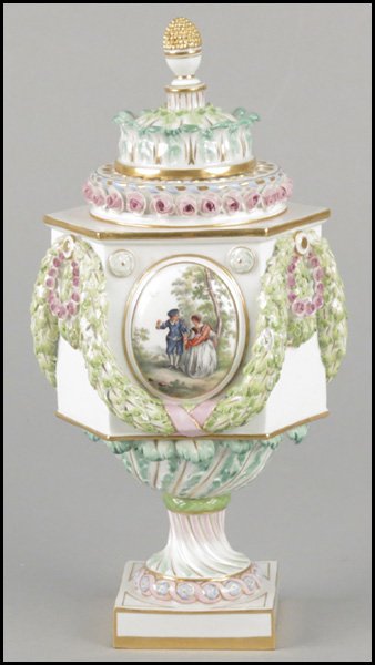 MEISSEN PORCELAIN POTPOURRI.: MEISSEN PORCELAIN POTPOURRI. Squared covered urn bears floral decoration throughout, and three painted oval scenes of courting couples. Underside marked Height: 10.5"