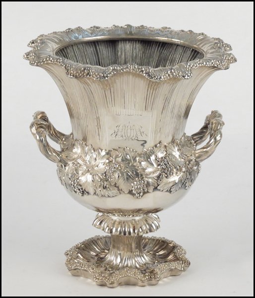 19TH CENTURY ENGLISH SHEFFIELD SILVERPLATE WIN: 19TH CENTURY ENGLISH SHEFFIELD SILVERPLATE WINE COOLER. Vine twist handles grape bunches, and leaves throughout. Bearing an engraved cartouche. Without liner Height: 11" Diameter: 10"