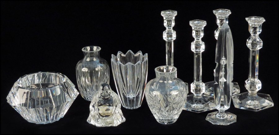COLLECTION OF GLASS TABLE ARTICLES.: COLLECTION OF GLASS TABLE ARTICLES. Including a Tiffany vase, a set of four Val St. Lambert candlesticks, an Orrefors rose bowl and vase, a glass vase, a glass buddha, and a glass religious sculpture 