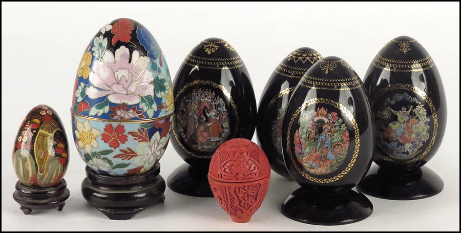 SET OF FOUR RUSSIAN PORCELAIN EGGS.: SET OF FOUR RUSSIAN PORCELAIN EGGS. Together with a cloisonne enamel egg, a faux cinnabar egg, and a papier mache egg