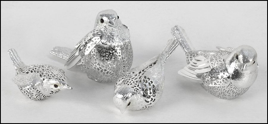 FOUR CHRISTOFLE SILVERPLATE BIRDS.: FOUR CHRISTOFLE SILVERPLATE BIRDS. With onyx eyes. From the 'Silver Light' collection, Comprised of 'The Wren', 'The Male Sparrow', 'The Baby Sparrow', and 'The Female Sparrow' Largest length 4"