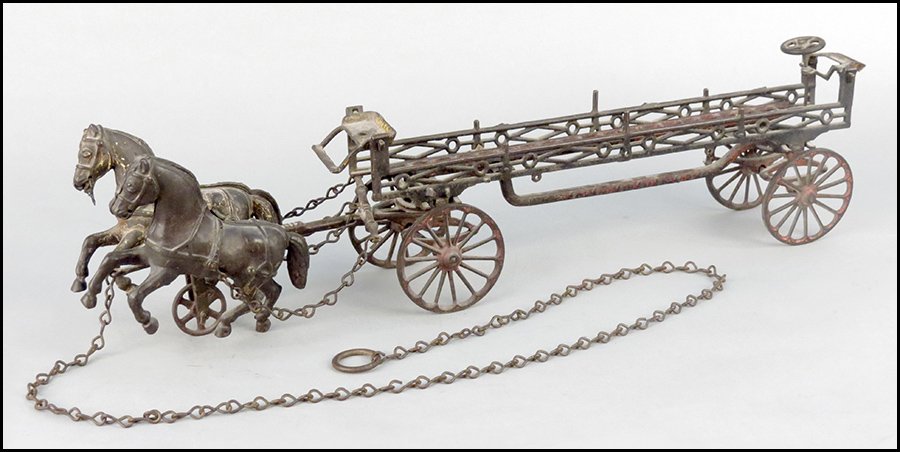 IVES PHOENIX CAST IRON LADDER WAGON.: IVES PHOENIX CAST IRON LADDER WAGON. H: 6.5" x W: 27" x D: 3.5"