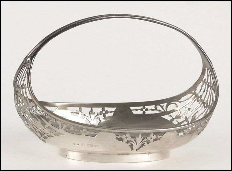 ENGLISH MAPPIN & WEBB FILIGREE STERLING SILVER: ENGLISH MAPPIN & WEBB FILIGREE STERLING SILVER BASKET. H: 4.5" W: 6.5" D: 3.5" Wt: 5.60ozt