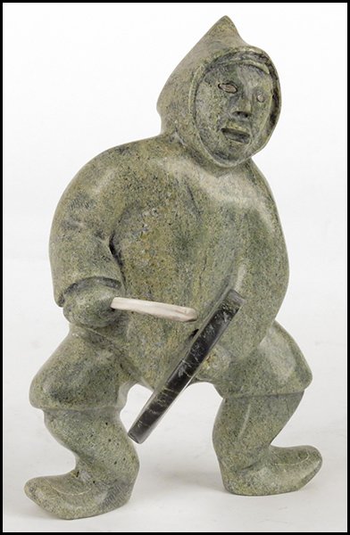 INUIT CARVED STONE DRUM DANCER.: INUIT CARVED STONE DRUM DANCER. From Cape Dorset. Bottom Signed in inuit 'Napatche Sharuy' Height 10.5"