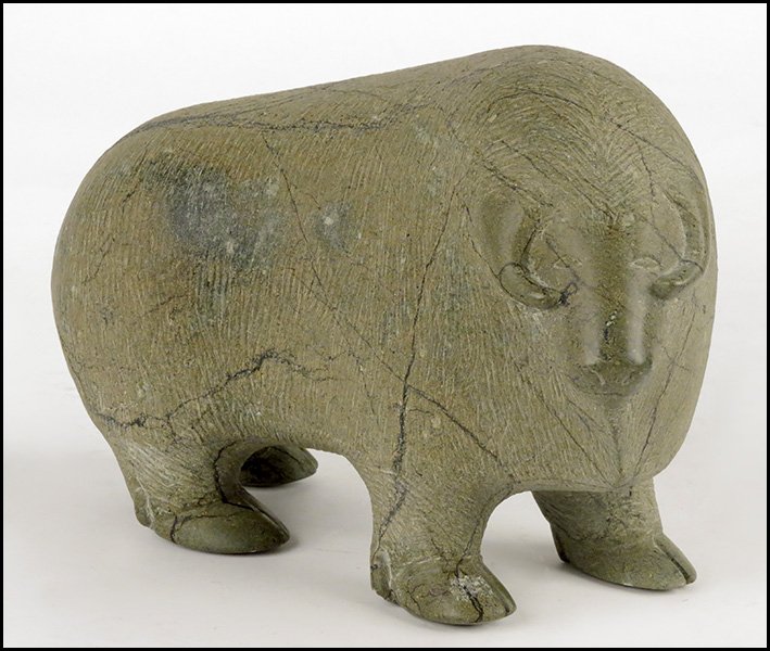 INUIT CARVED STONE BUFFALO.: INUIT CARVED STONE MUSK OX. H: 8" x W: 11 x D: 4.5"