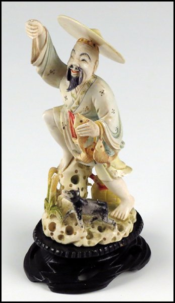 CHINESE CARVED IVORY FIGURE OF A FISHERMAN AND A DOG.: CHINESE CARVED IVORY FIGURE OF A FISHERMAN AND A DOG. Provenance: The Collection of G. Jules Marder, past president of the Oriental Art Club of Chicago H:7"