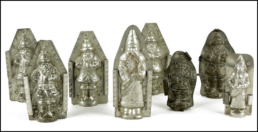 EIGHT SANTA CLAUS CHOCOLATE MOLDS.: EIGHT SANTA CLAUS CHOCOLATE MOLDS. Includes two German molds Tallest 9"