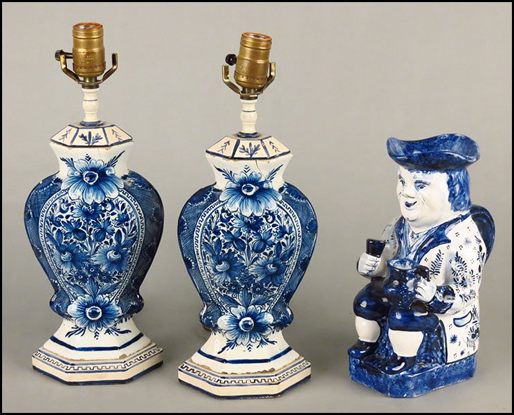 PAIR OF 18TH CENTURY FRENCH FAIENCE URNS.: PAIR OF 18TH CENTURY FRENCH FAIENCE URNS. Converted into table lamps. Together with a faience Toby jug Height 9.5"