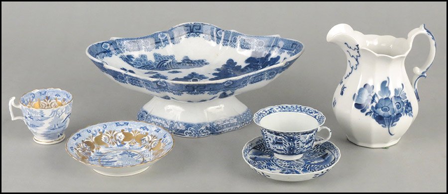 COLLECTION OF BLUE AND WHITE PORCELAIN.: COLLECTION OF BLUE AND WHITE PORCELAIN. Comprised of a Royal Copenhagen pitcher, a Spode footed dish, and two tea cups and saucers Pitcher height 6.25"