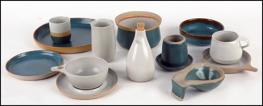 COLLECTION OF BENNINGTON STONEWARE.: COLLECTION OF BENNINGTON STONEWARE. Signed David Gil. Includes four dinner plates, ten 6.5" diameter plates, a pair of oil and vinegar jars, two 4" tall cups, two coffee cups, two bowls, and a variety