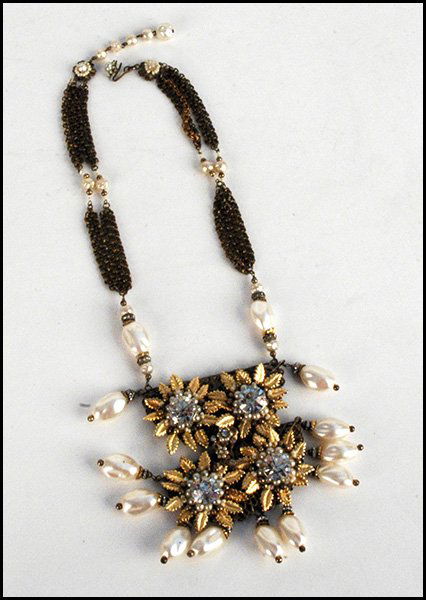 MIRIAM HASKELL NECKLACE.: MIRIAM HASKELL NECKLACE. Comprised of white rhinestones, faux baroque and round pearls, and gold tone leaves. Clasp is stamped Miriam Haskell Length: 20.5", excluding 2.5" faux pearl extension