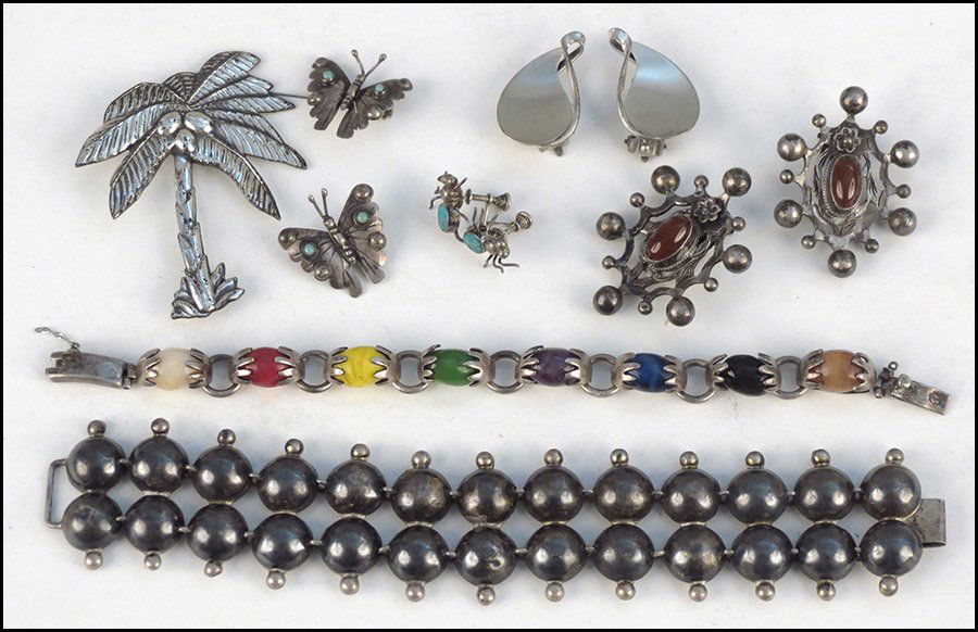 TWO MEXICAN STERLING SILVER BRACELETS.: TWO MEXICAN STERLING SILVER BRACELETS. Together with a pair of sterling silver and turquoise spider form screwback earrings, a pair of sterling silver and turquoise butterfly pins, a pair of sterling