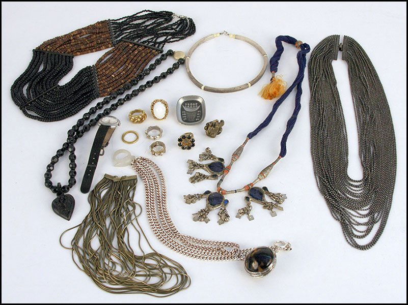 COLLECTION OF JEWELRY.: COLLECTION OF JEWELRY. Comprised of a Kenneth Lane cocktail ring, a Tenn pewter brooch, a Ralph Lauren faux tortoise shell locket necklace, a Lucien Piccard automatic incabloc watch, and various neckl