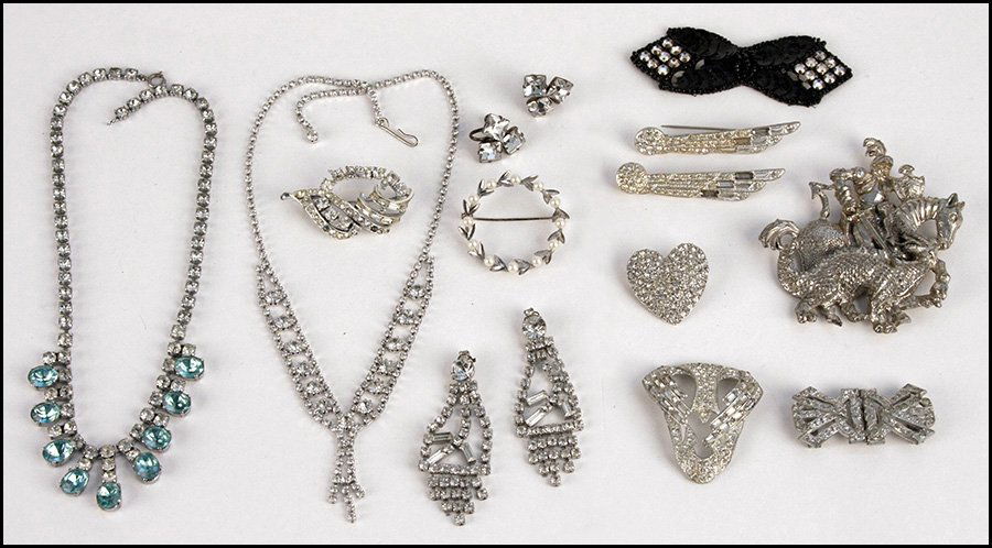 ST. GEORGE AND THE DRAGON BROOCH.: ST. GEORGE AND THE DRAGON BROOCH. Together with two rhinestone necklaces, a pair of rhinestone brooches, a pair of rhinestone screwback earrings, a rhinestone two-part clip, a white rhinestone brooch,