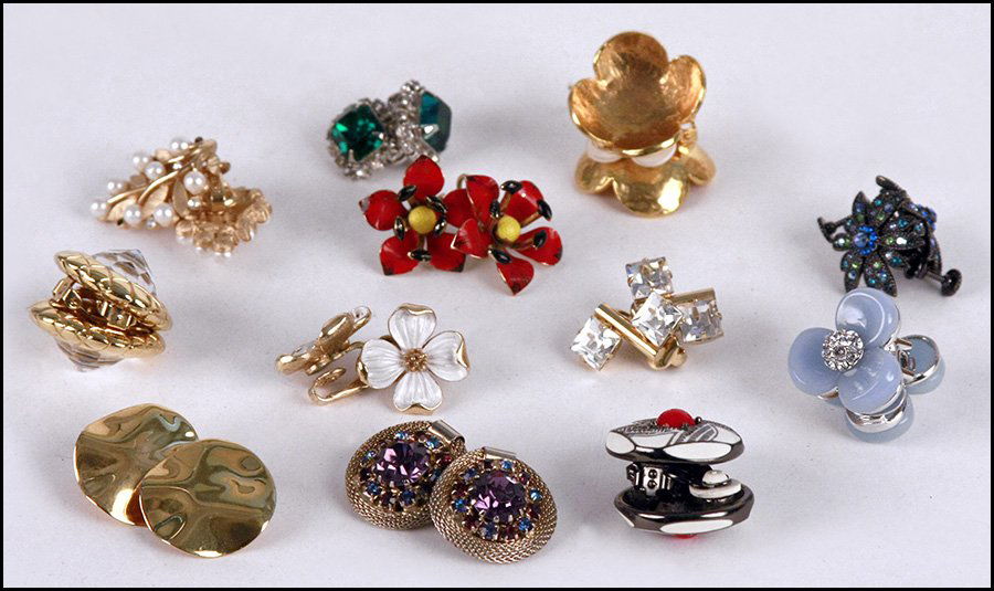 TEN PAIRS OF SIGNED EARCLIPS.: TEN PAIRS OF SIGNED EARCLIPS. Including Weiss, Kramer, Trifari, Nolan Miller, Delphine Nardin, Erwin Pearl, Joan Rivers, Hattie Carnegie, and Monet