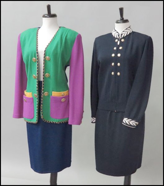 TWO ST. JOHN KNIT SKIRT SUITS.: TWO ST. JOHN KNIT SKIRT SUITS. Comprised of a multi-colored jacket and navy blue skirt. Together with an embroidered navy blue zip jacket, and navy blue skirt sizes 8-10