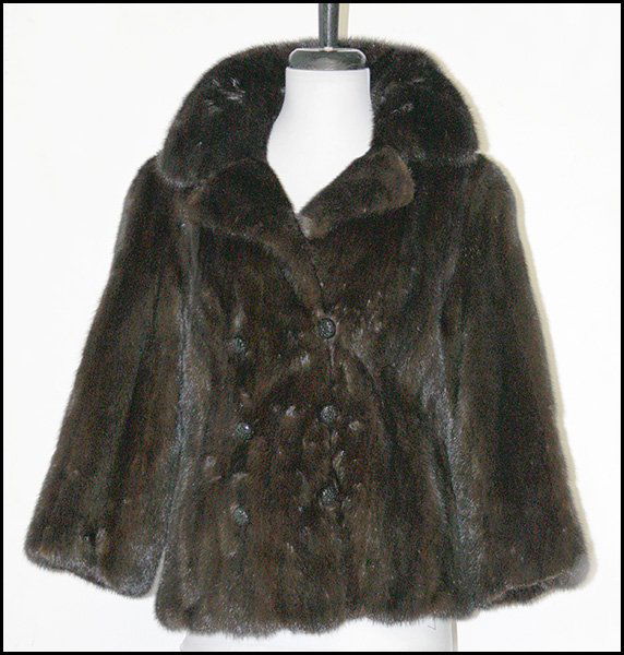 MAHOGANY MINK DOUBLE BREASTED JACKET.: MAHOGANY MINK DOUBLE BREASTED JACKET. Bearing black rhinestone buttons, and a rear belt Size 4-6