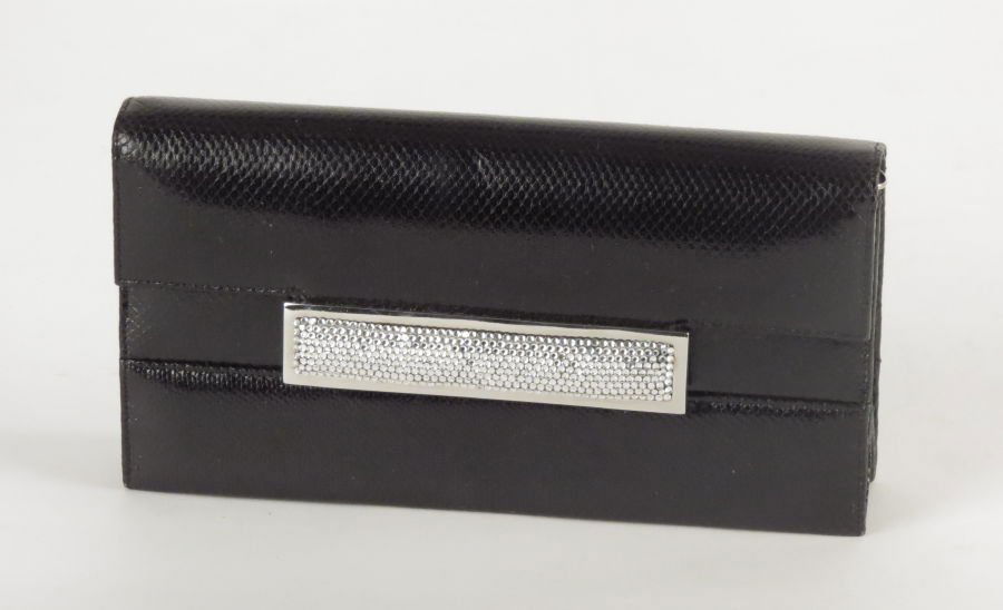 JUDITH LEIBER BLACK LIZARD SKIN EVENING CLUTCH.: JUDITH LEIBER BLACK LIZARD SKIN EVENING CLUTCH. With white rhinestone closure Width: 5" Length: 9"