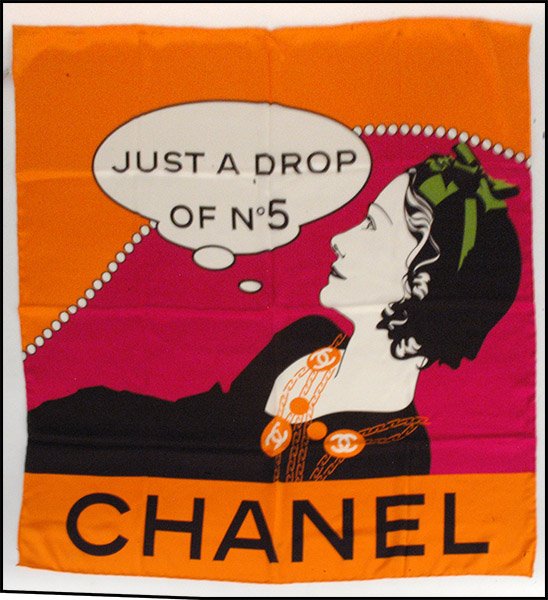 CHANEL SILK SCARF.: CHANEL SILK SCARF. Depicting Coco Chanel beneath a word bubble reading "Just a Drop of No 5" 34" x 34"