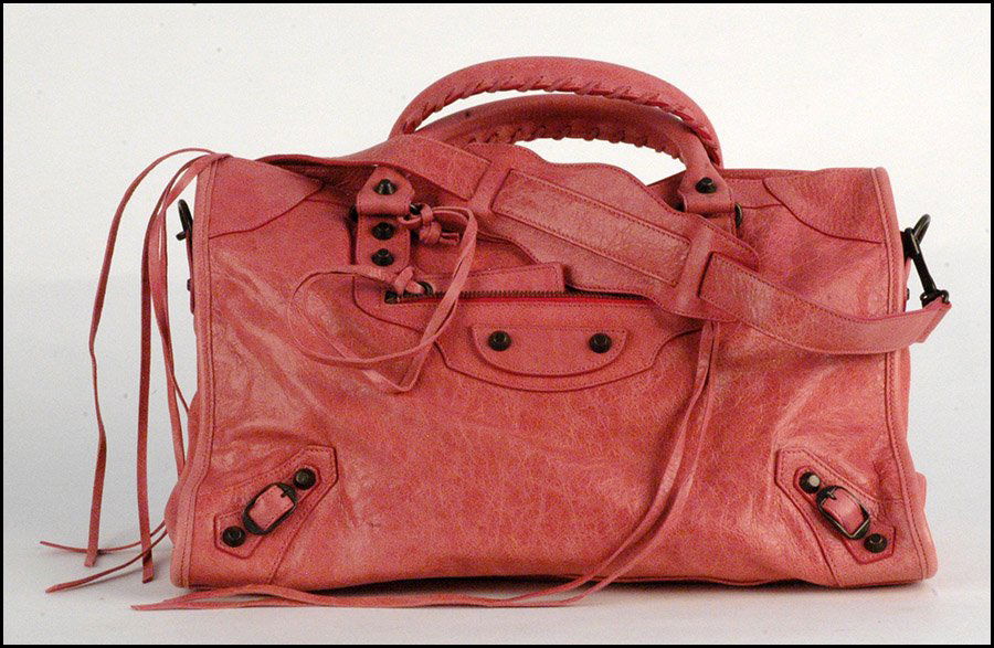 BALENCIAGA PINK LEATHER MOTORCYCLE HANDBAG.: BALENCIAGA PINK LEATHER MOTORCYCLE HANDBAG. Bearing an attached hand mirror, and removeable strap. With dust bag H: 10" W: 14.5" D: 5"