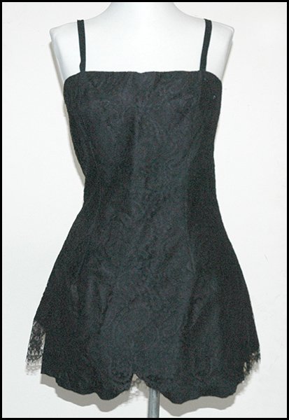 BLACK LACE OVERLAY SLEEVELESS ROMPER.: BLACK LACE OVERLAY SLEEVELESS ROMPER. Marshall Field & Company Approximately a size 6