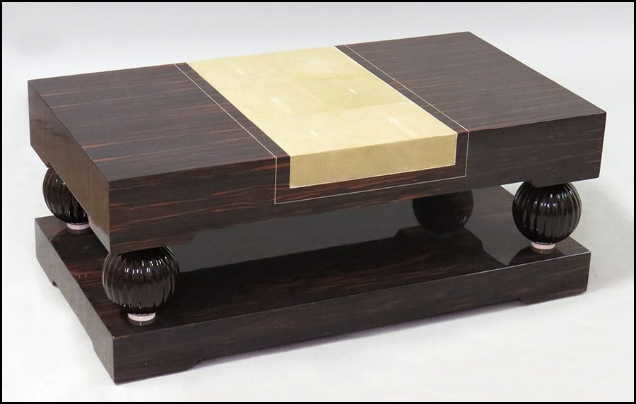ART DECO MACASSAR COCKTAIL TABLE.: ART DECO MACASSAR COCKTAIL TABLE. Bearing an inset shagreen top H: 17" W: 43" D: 24"